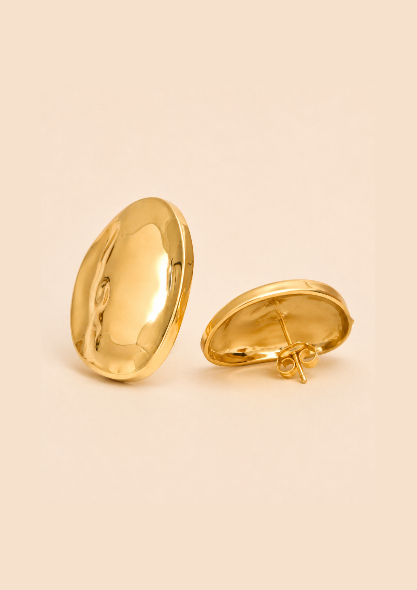THE STANDARD — Boucles d'oreilles clous surdimensionnées doré